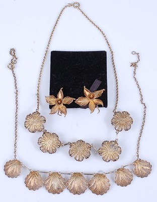 Lot 385 - A pair of filigree gilt flowerhead ear clips...