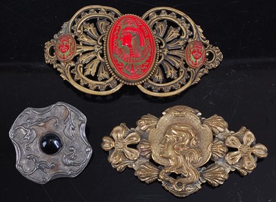 Lot 386 - An Art Nouveau embossed gilt metal lozenge...