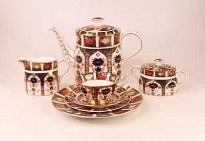 Lot 215 - A Royal Crown Derby three-piece tea service,...