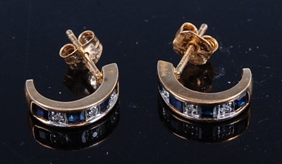 Lot 397 - A pair of yellow metal, blue and white...