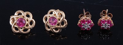 Lot 398 - A pair of yellow metal and pink sapphire set...