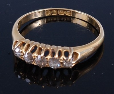 Lot 420 - An Edwardian 18ct gold diamond five stone ring,...