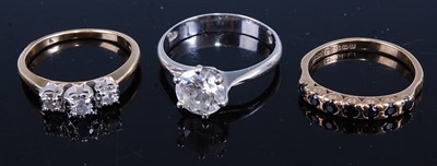 Lot 433 - A 9ct gold sapphire set half hoop ring, size N;...