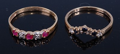 Lot 434 - A yellow metal, ruby and diamond point set...