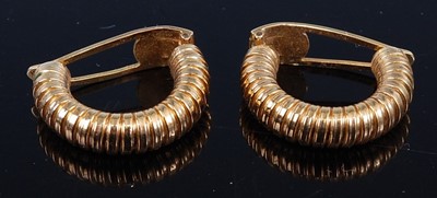 Lot 435 - A pair of modern 9ct hollow gold half hoop ear...