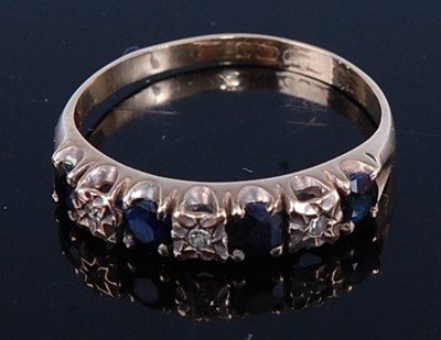 Lot 438 - A 9ct gold, sapphire and diamond point set...