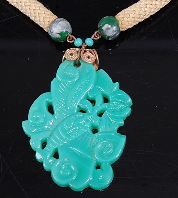 Lot 444 - A beaded glass necklace, 46cm; together with a...