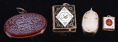 Lot 452 - A carved scarab beetle pendant; together with...