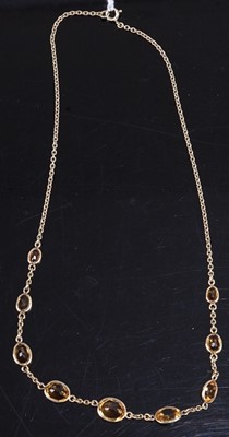 Lot 469 - A modern 9ct gold and faceted graduated...