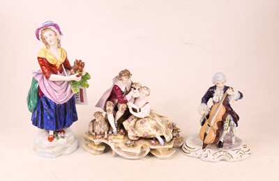 Lot 221 - A porcelain figure modelled as lady in purple...