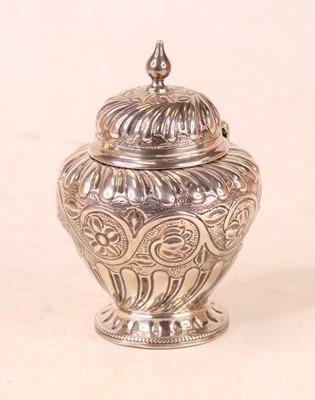 Lot 244 - A Victorian silver canister, the hinged domed...