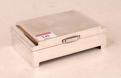 Lot 245 - An Art Deco white metal table cigarette box,...