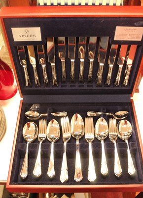 Lot 264 - A modern stained beech cased canteen of silver...