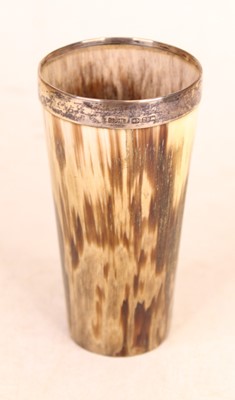 Lot 286 - A late Victorian horn beaker, having a silver...