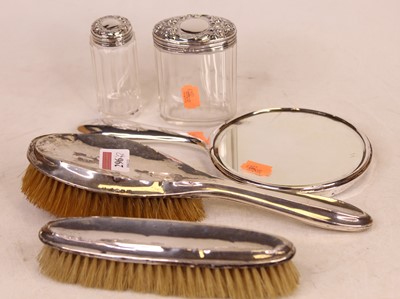 Lot 296 - Two silver backed brushes; together with...