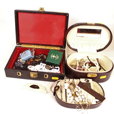 Lot 327 - A leather clad jewellery box and contents, to...