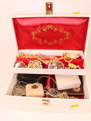 Lot 331 - A leather clad jewellery box and contents, to...