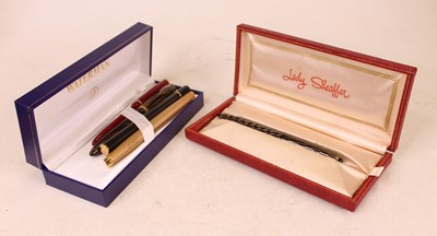 Lot 365 - A Parker Slimfold fountain pen, having red cap...