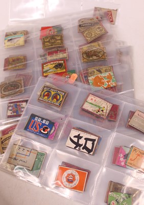 Lot 541 - A collection of matchbox lids