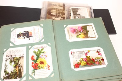 Lot 543 - Two albums containing a collection of vintage...