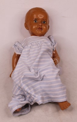 Lot 560 - A 20th century child's celluloid doll