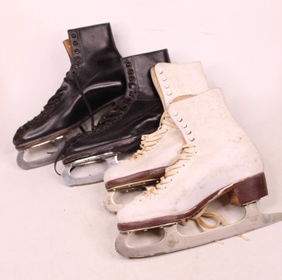 Lot 572 - Two pairs of vintage ice skates