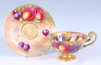 Lot 2040 - A Royal Worcester porcelain cabinet cup and...