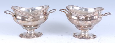 Lot 2175 - A pair of early George III silver pedestal...