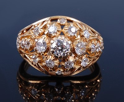 Lot 2295 - A yellow metal diamond bombe shaped cluster...