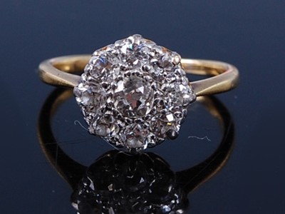 Lot 2296 - A yellow and white metal diamond circular...