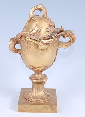 Lot 2434 - * A Rococo Revival gilt bronze twin handled...