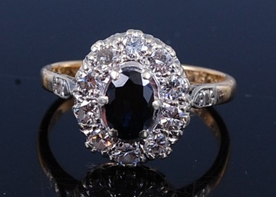 Lot 2335 - A yellow and white metal, sapphire and diamond...