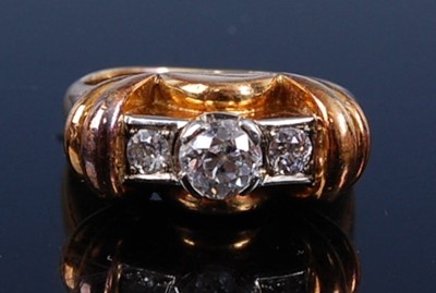 Lot 2337 - A yellow and white metal diamond three stone...