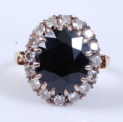 Lot 2314 - A yellow and white metal, sapphire and diamond...