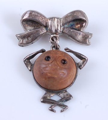 Lot 124 - A WW I novelty touchwood charm, the convex...