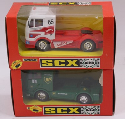 Lot 1445 - 2 x Scaletrix Spanish SCX Mercedes Trucks to...