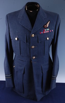 Lot 134 - A post WW II R.A.F. navigators dress tunic,...