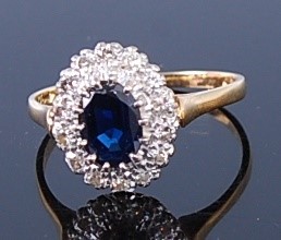 Lot 2327 - A yellow and white metal, sapphire and diamond...