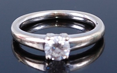 Lot 2322 - A white metal diamond single stone ring,...