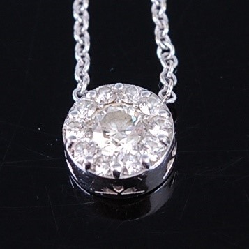 Lot 2324 - An 18ct white gold 'Hearts on Fire' diamond...