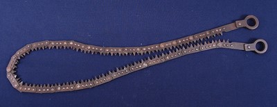 Lot 21 - A WW II trench saw, with War Department mark...