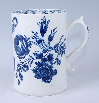Lot 2045 - A Lowestoft porcelain tankard, blue and white...