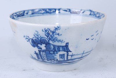 Lot 2044 - A Lowestoft porcelain tea bowl, blue and white...