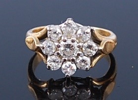 Lot 2375 - A yellow metal diamond flower head cluster...