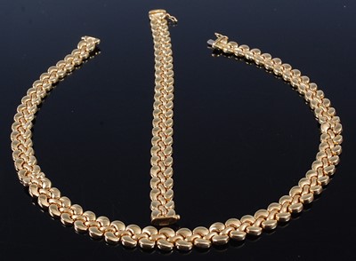 Lot 2353 - A contemporary 18ct yellow gold necklace with...
