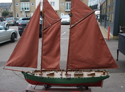 Lot 66 - A wooden scratch-built model of a Schooner...