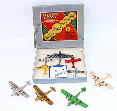 Lot 1073 - Dinky Toys pre-war aeroplanes group to include,...