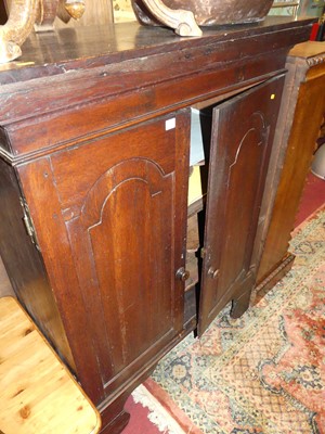 Lot 1366 - An antique joined oak double door side...