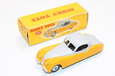 Lot 1742 - Dinky Toys, 157 Jaguar XK120, yellow lower...