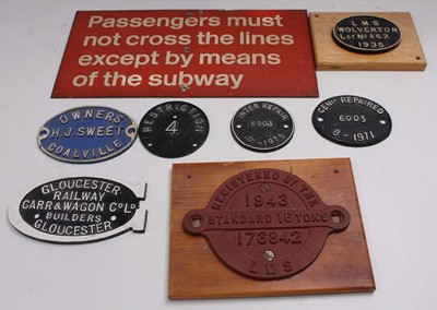 Lot 33 - Tray containing seven cast iron wagon plates...
